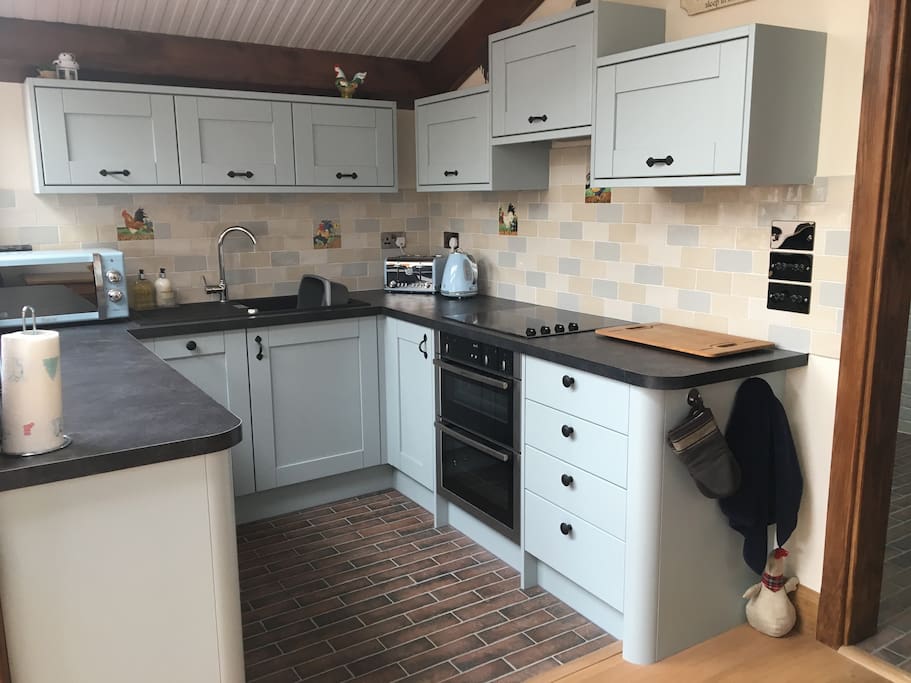 Designer kitchen with double oven and dishwasher