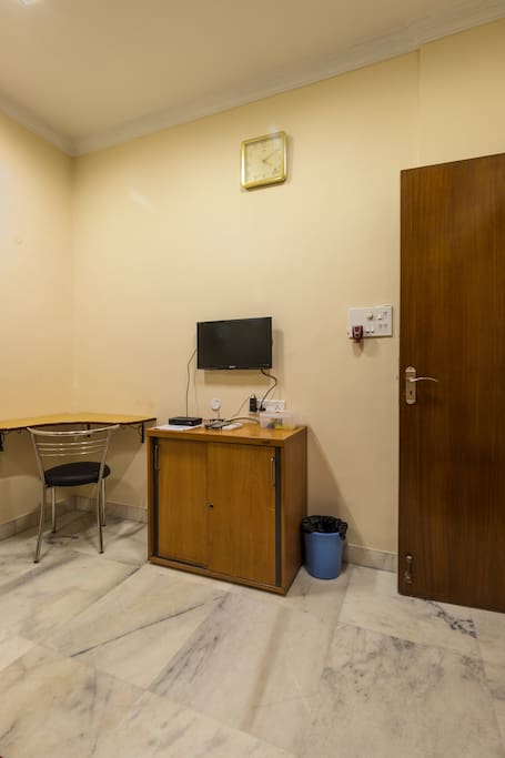 TV with cable and a work/laptop area is in the room for those business trips.