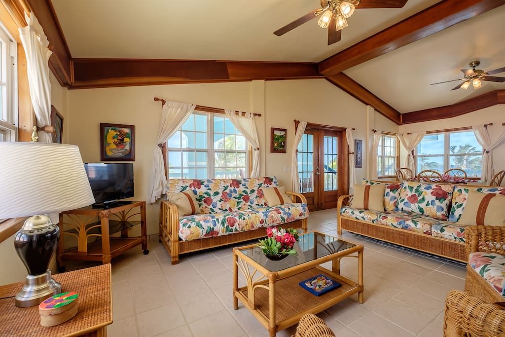 Light and airy living room!
French doors lead to huge balcony that overlooks the beach and sea.