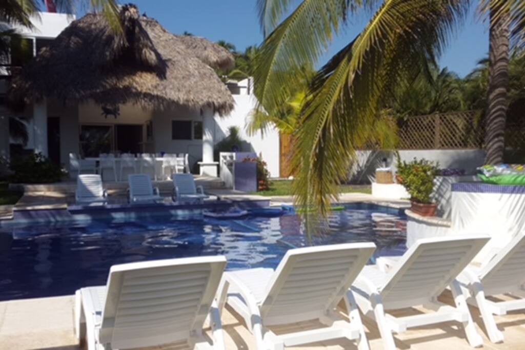 Pool has 3 chaises inside the pool and 4 outside. It has an inside the water bench.
