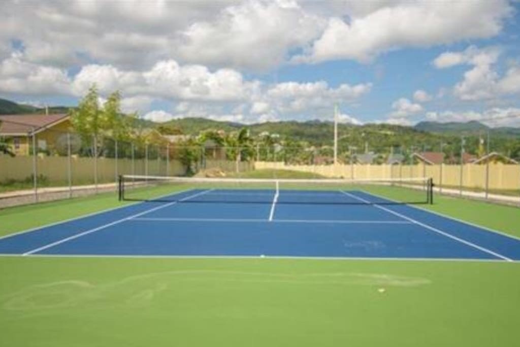 Tennis court with jogging path