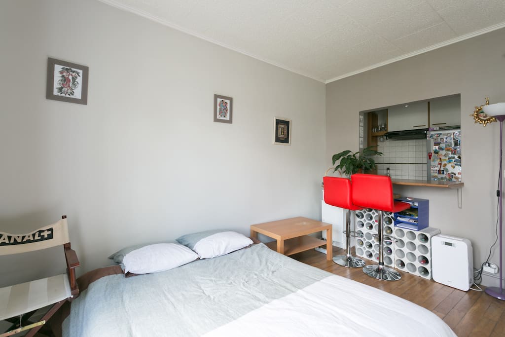 bedroom and open-plan kitchen