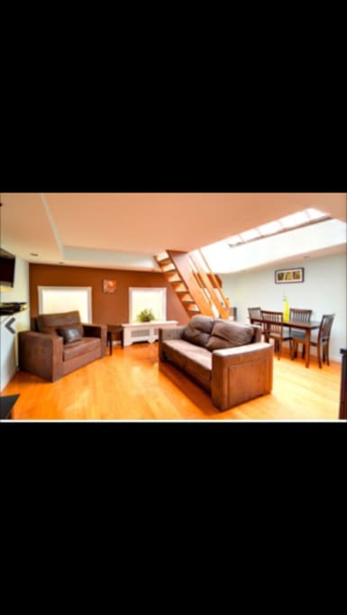 Large downstairs with 9-foot skylight, very bright. Professional picture from old listing. Apartment has been updated