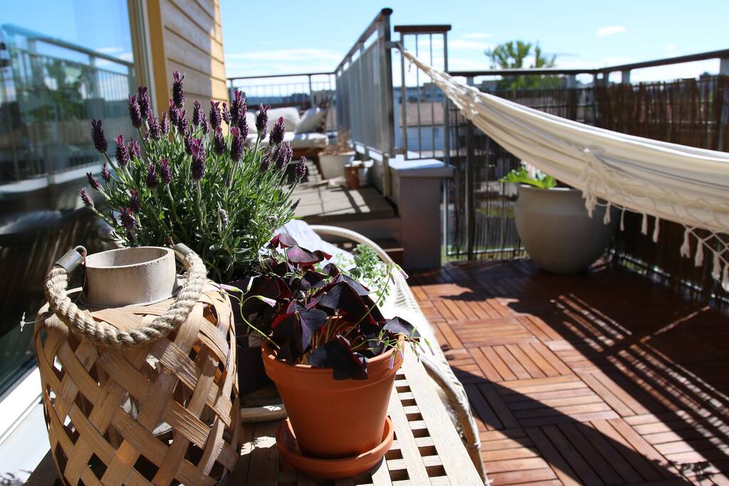 Balcony with BBQ and hammock for lazy sunny afternoons