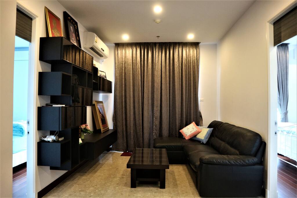 The living room, which provides you a good Bangkok view from the top level of the building.