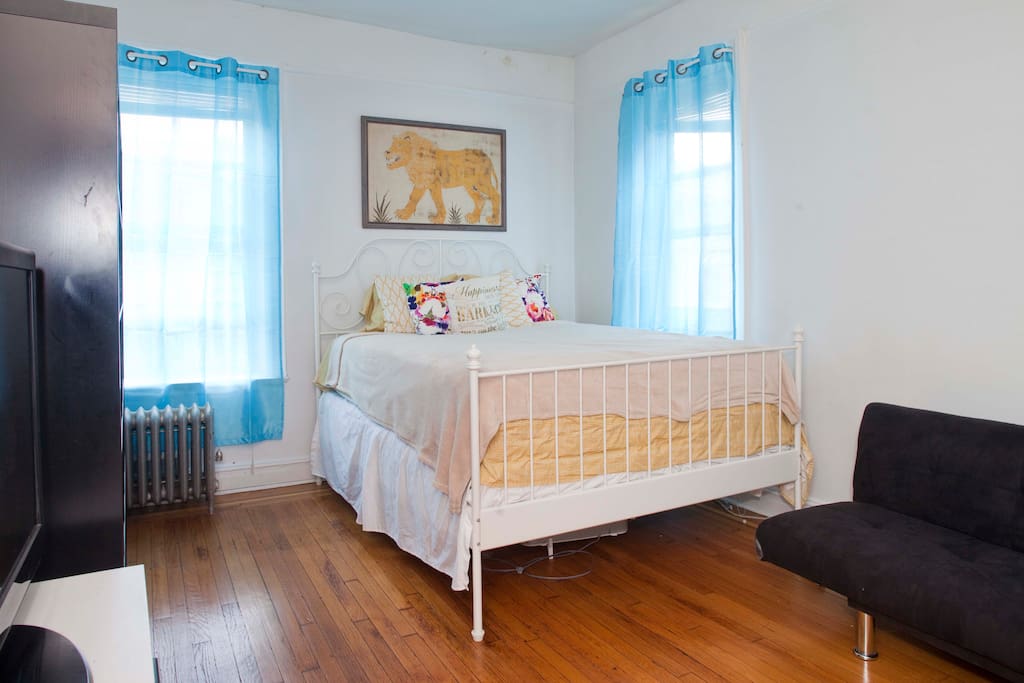 Your bedroom is sunny and spacious. I provide a love seat, TV, and WIFI.