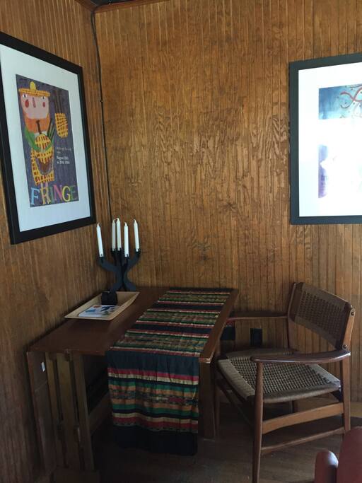 Dining table in cozy open living room.
