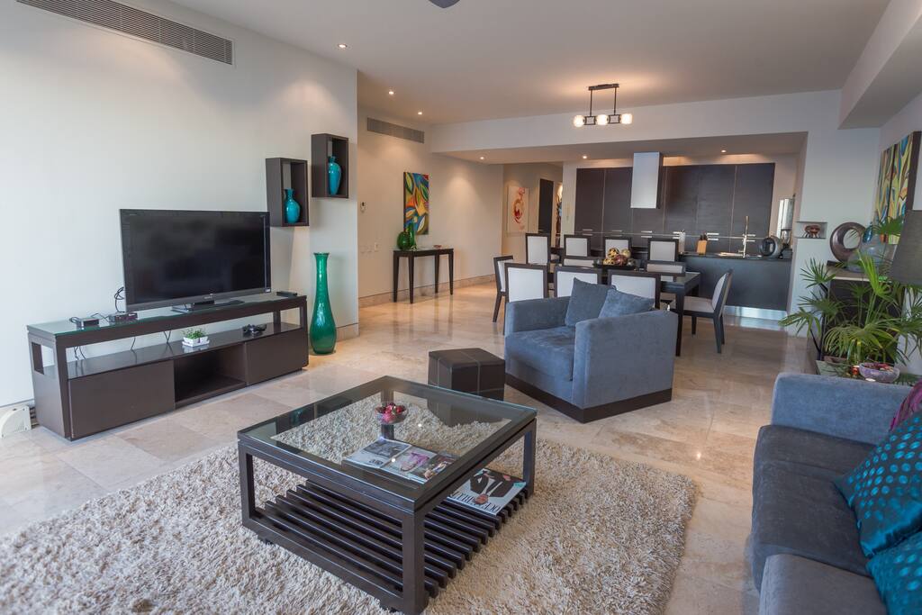 Living room area with Apple TV & Shaw Cable
