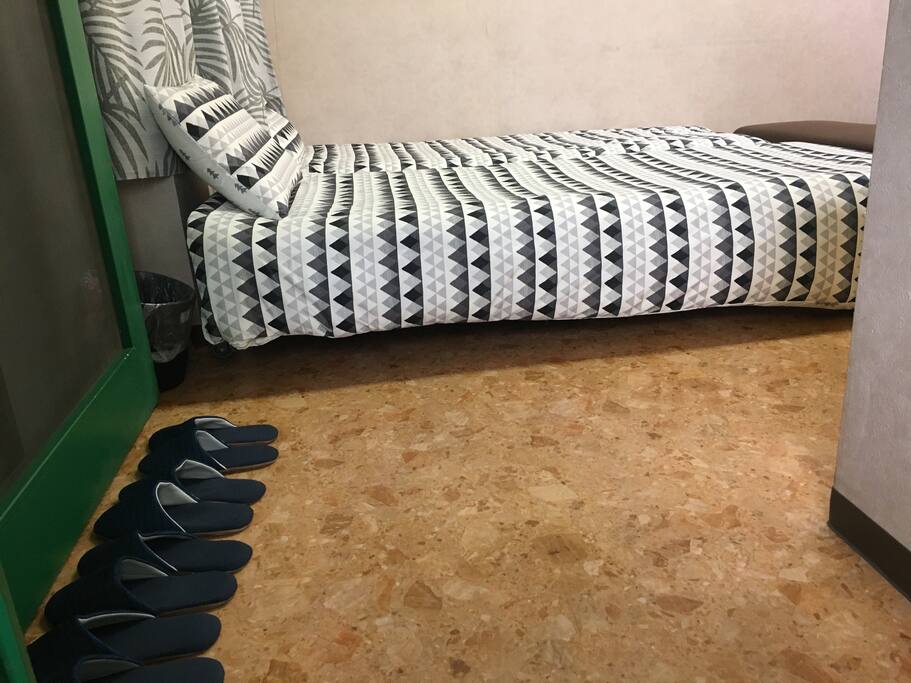 No shoes is allowed inside the room.