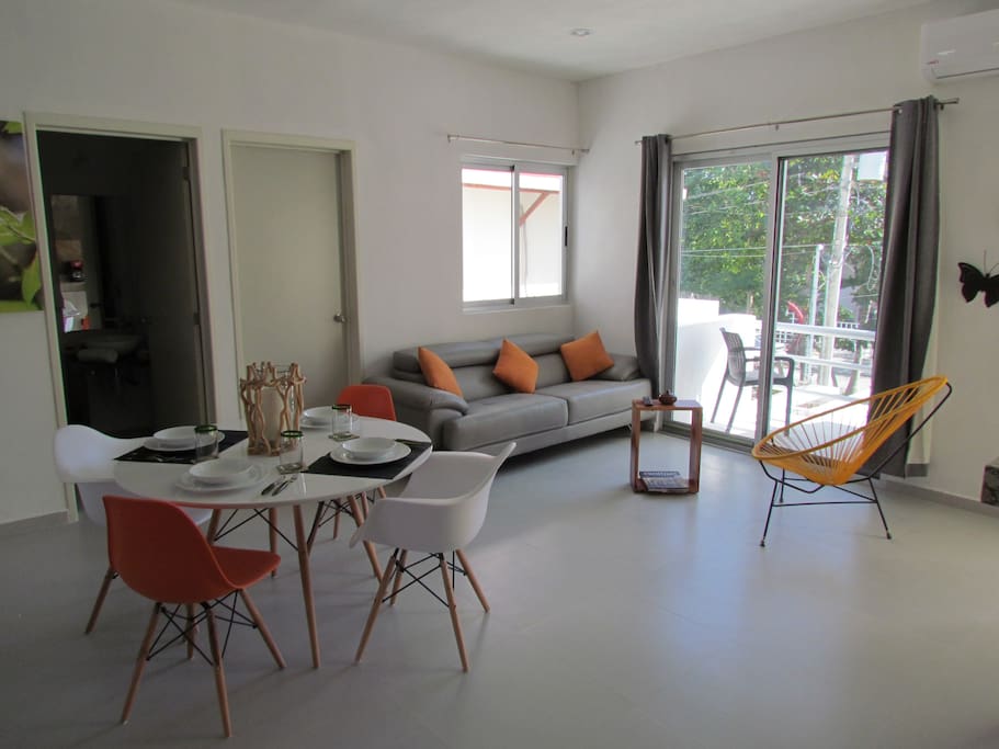 Living and dining room with balcony