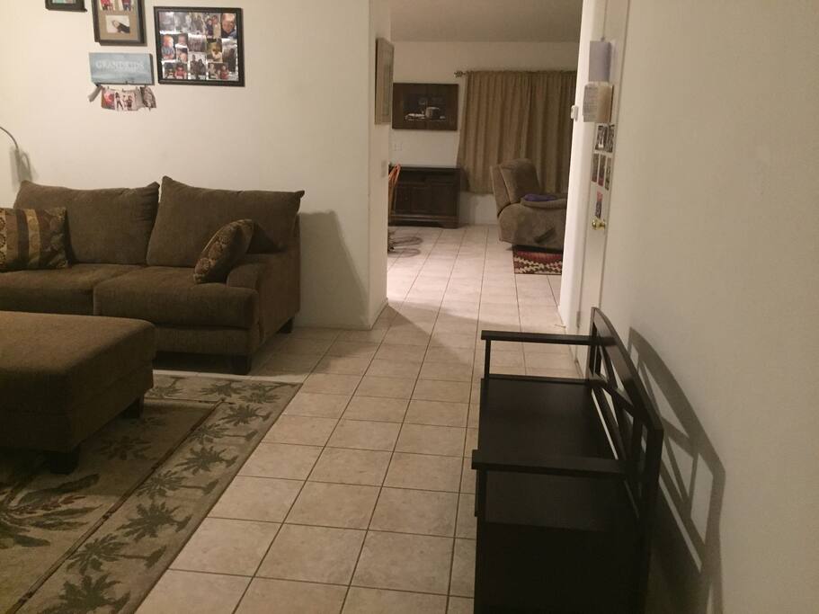 Front room entry into living room and kitchen