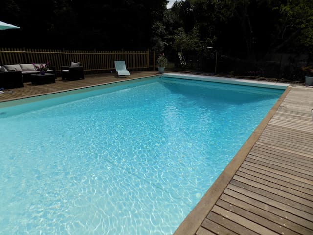Room in town center house with pool