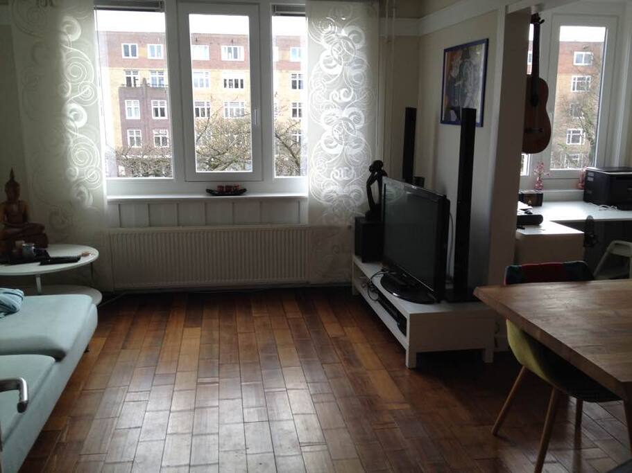 The living room viewed from the entrance corridor