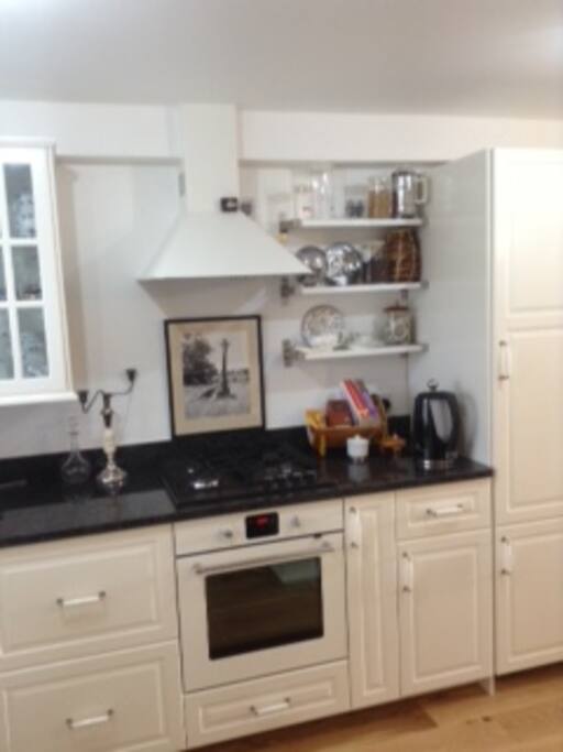 Kitchen with space in the fridge for you to keep stuff :)