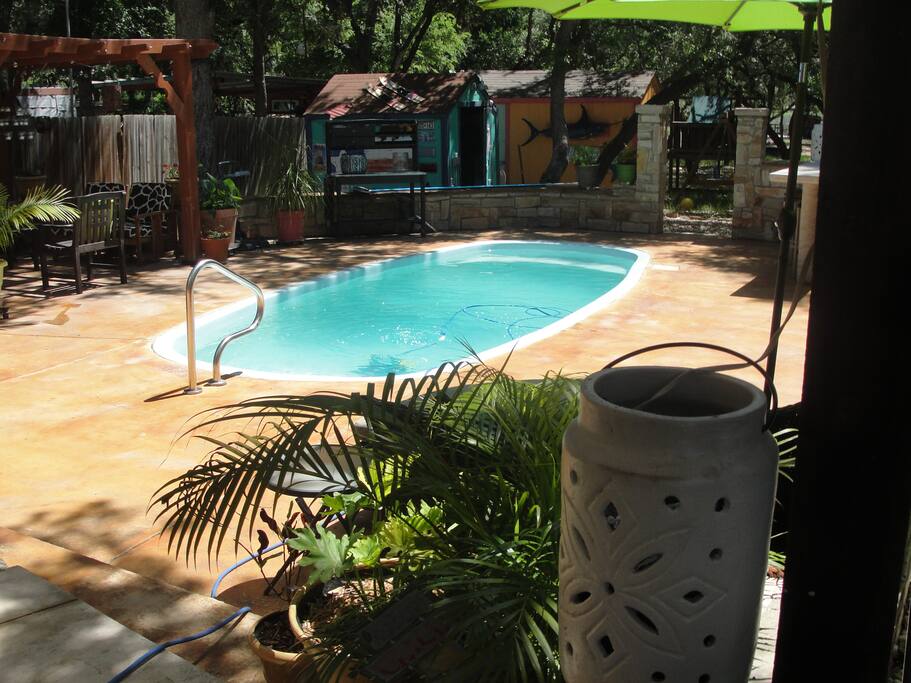 5' pool and deck in the front of the house