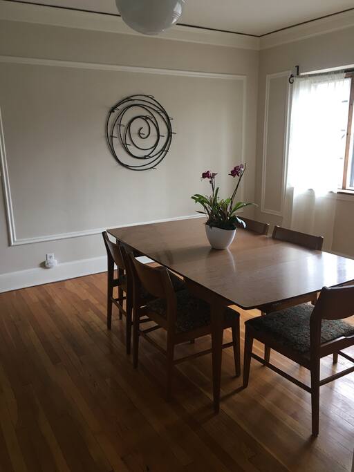 The spacious dining room has great natural lighting!
