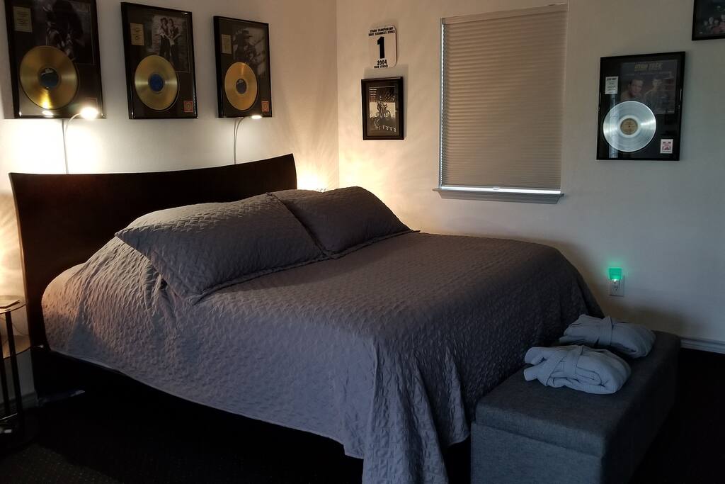 King size memory foam bed with touch reading lights above it, summer set up