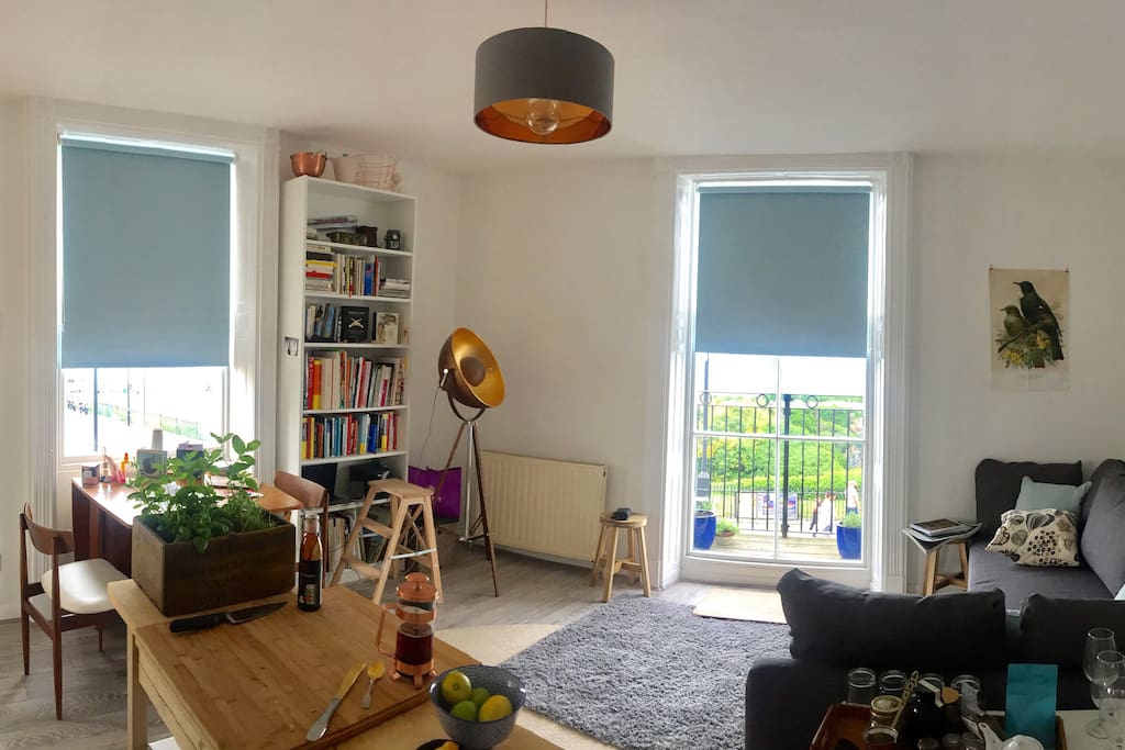Seaview lounge room with open plan kitchen & dining