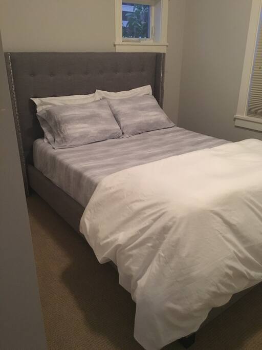 Beautiful upholstered bed with queen memory foam mattress!