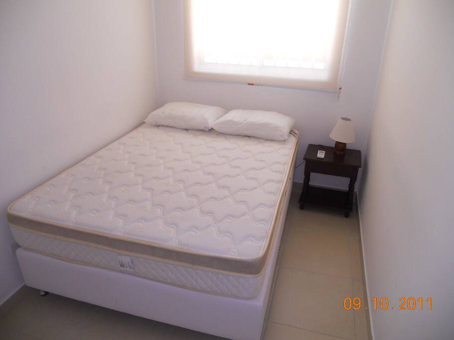 Quarto casal com ar condicionado