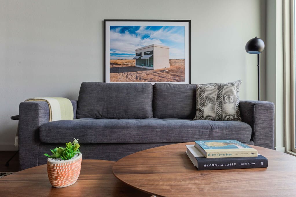 Stylishly furnished living room, with a queen sleeper sofa from Article furniture