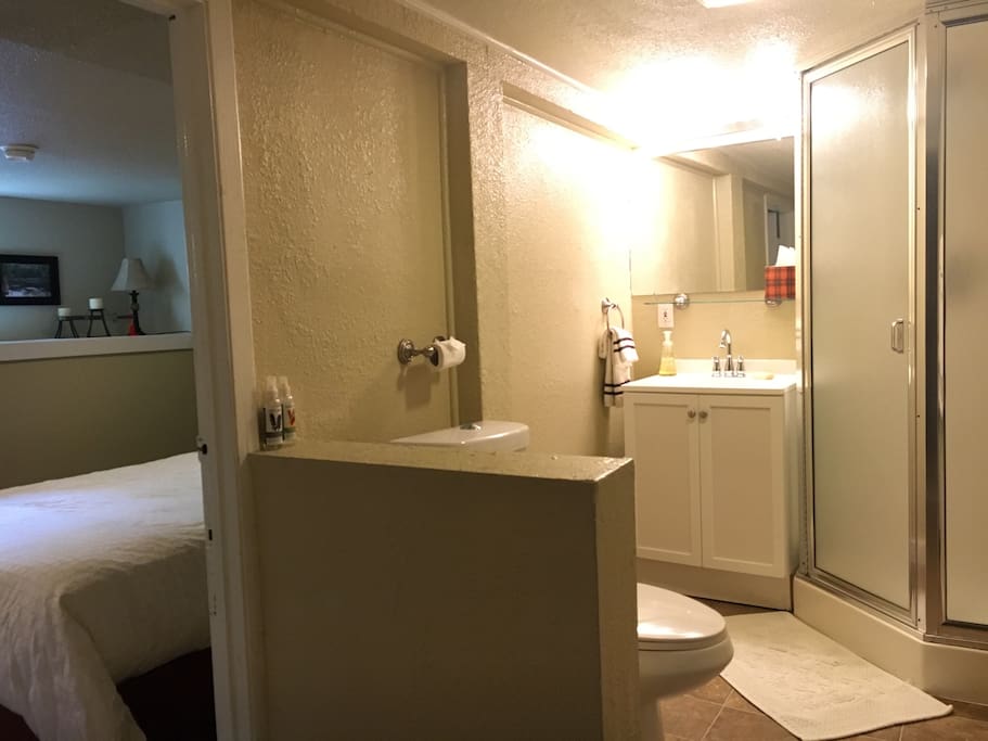 Bathroom has two entrances from Queen bedroom and hallway.