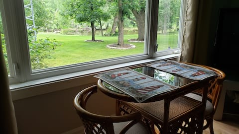 Top Airbnb: Retreat surrounded by majestic trees along a river in Rideau Jock