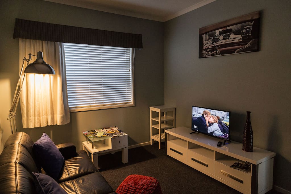 Private sitting room with new TV.