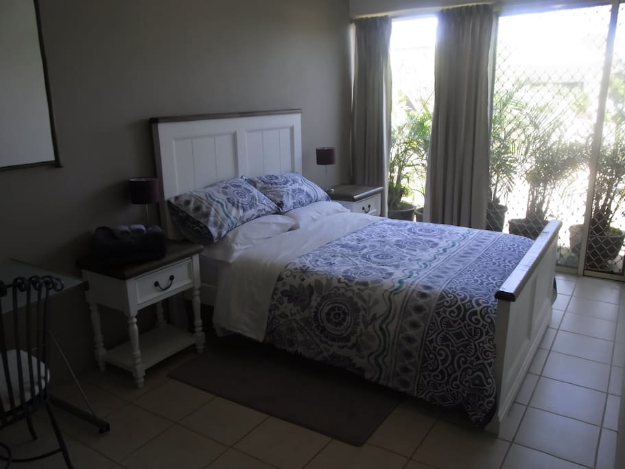 Double bed with new furniture. Fresh and lovely.