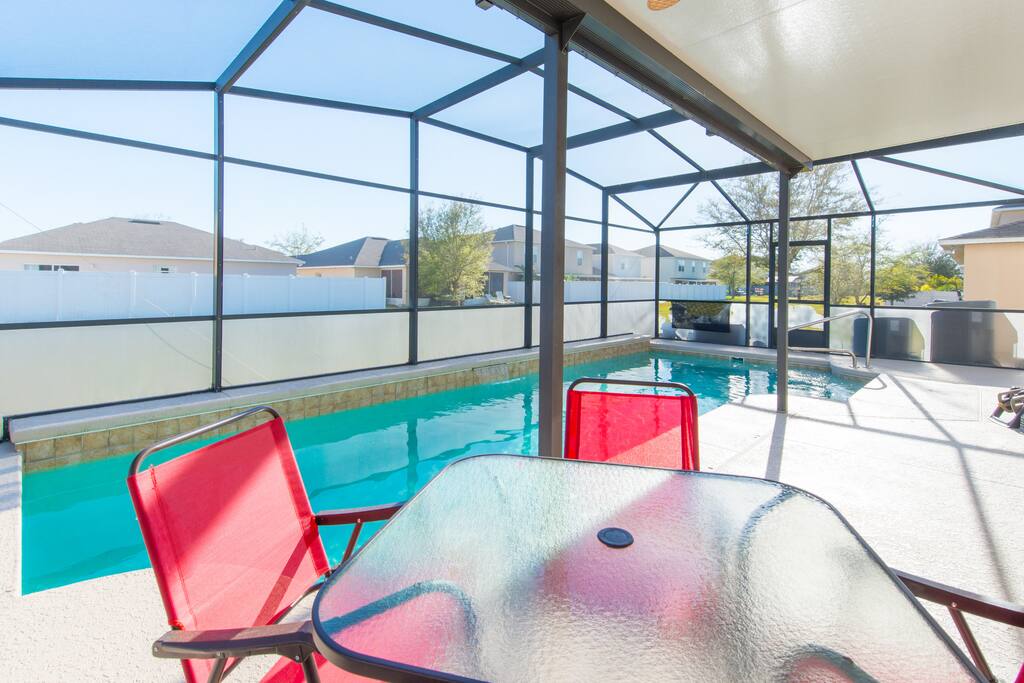 Bask in the sun in this gorgeous covered swimming pool