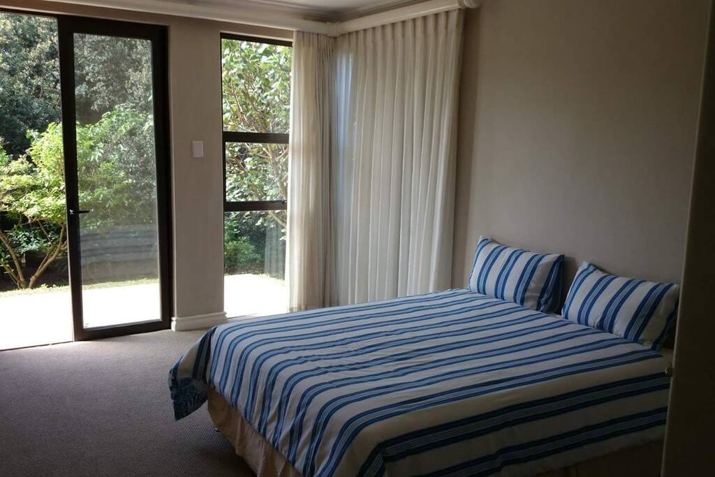 One of three spacious bedrooms.