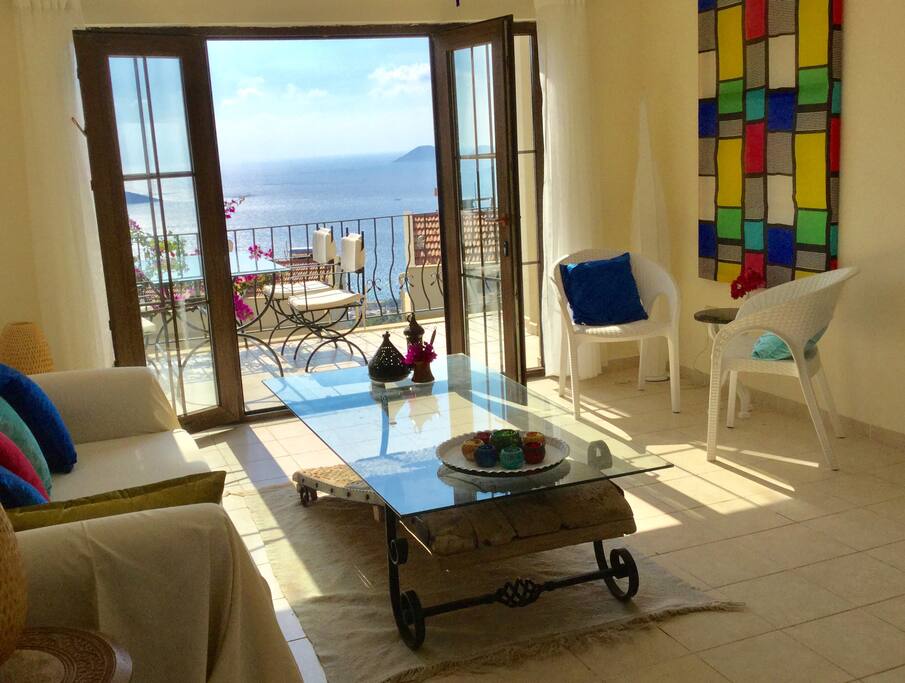 Living room, balcony & view to the islands