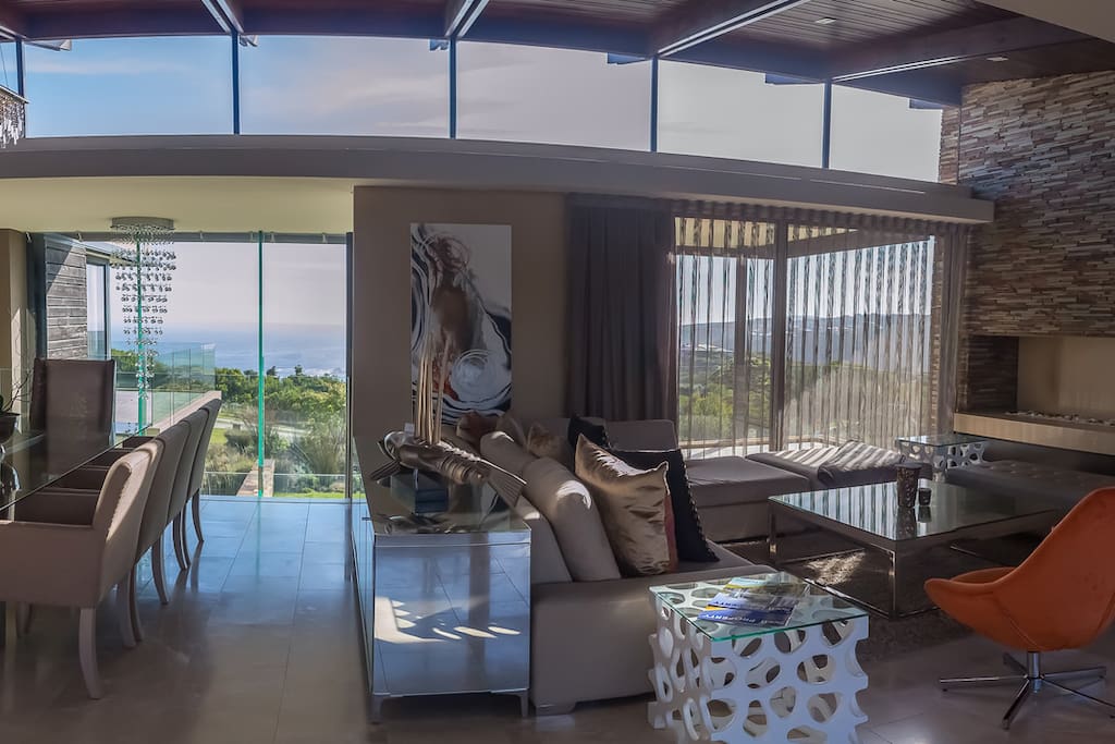Sunlit open plan dining and living area with state-of-the are technology