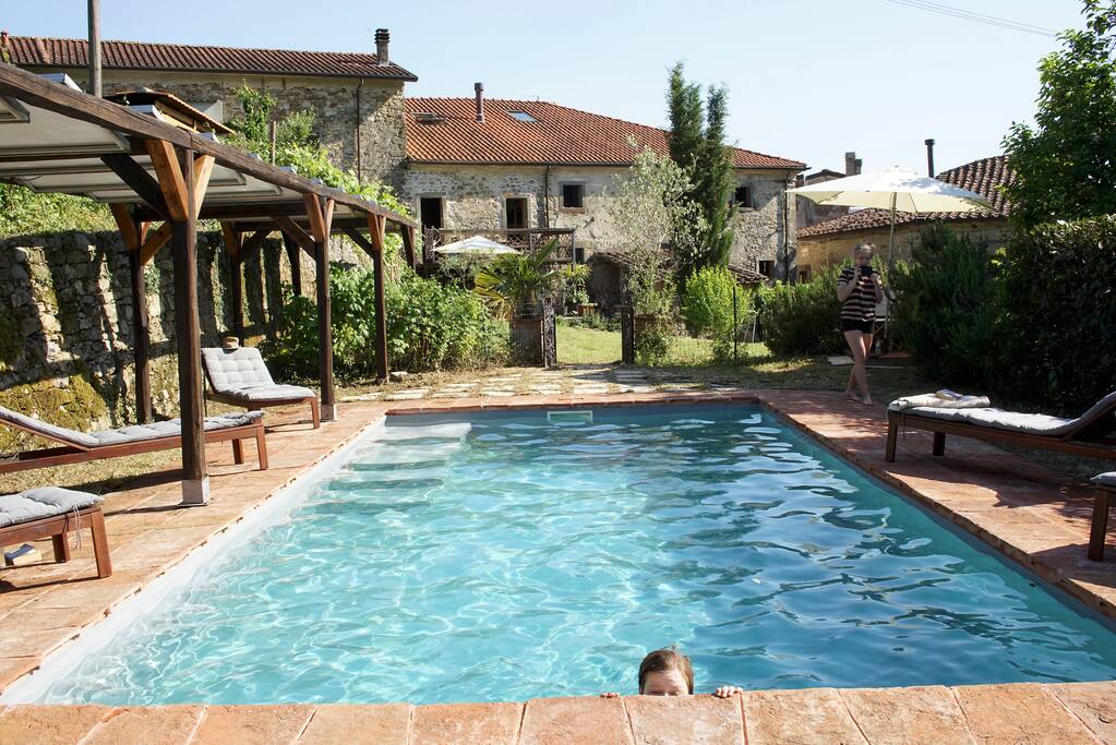 Pool at the end of the garden looking towards the house