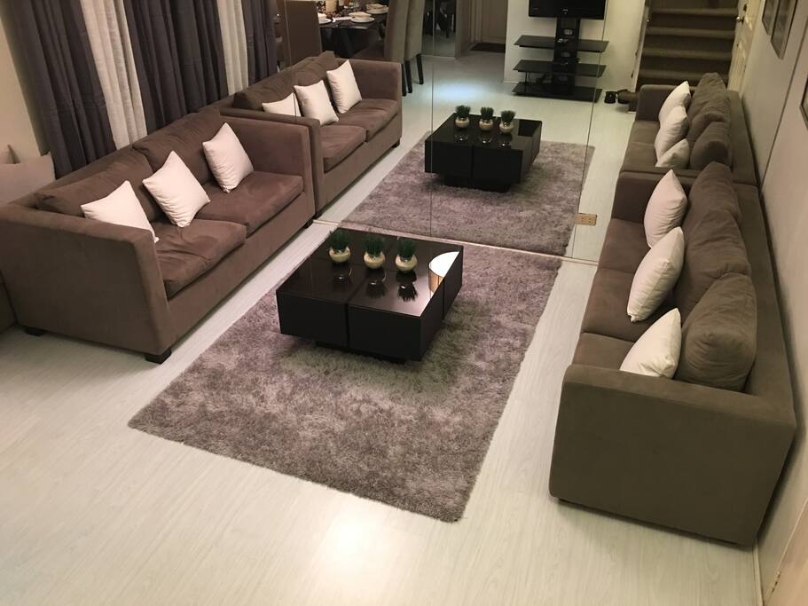 the favorite spot of the family and guests, the spacious airconditioned living room of the unit.
