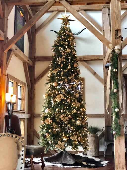 It's Christmastime at Legacy Ranch! You & your guests will be in awe with this sparkling & beautifully decorated 12' tree! Each and every room in this historic barn is decorated with the magic of Christmas just for you!
