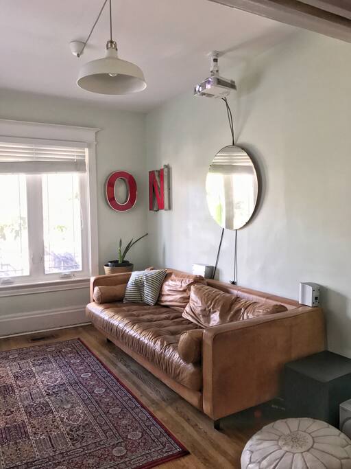 The living room can be completely closed off from the rest of the house for an additional private sleeping space. The couch is wide and comfy :)