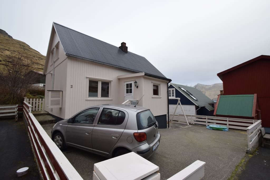 Front view with parking and swing set