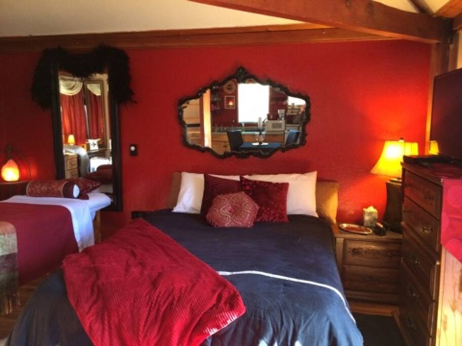 Queen Bed & Massage Table.