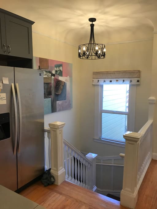 Stairs down to the front door.
