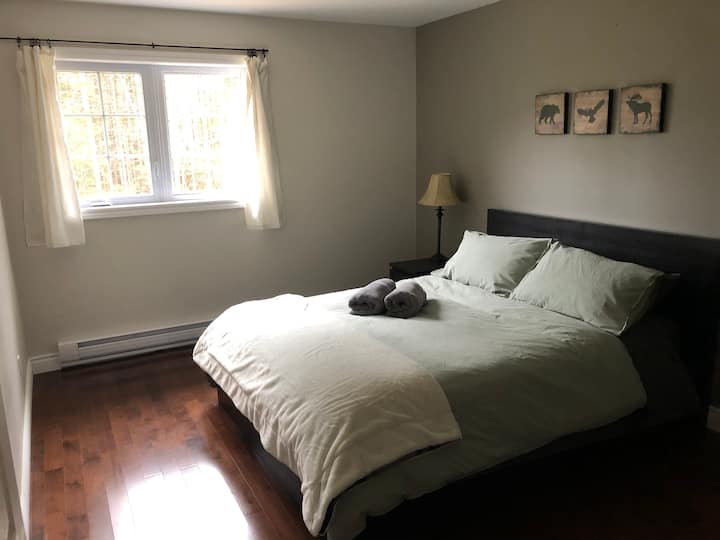 Main level bedroom with Queen sized bed.