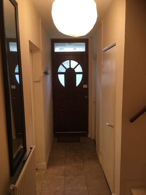 corridor with storage and extra toilet