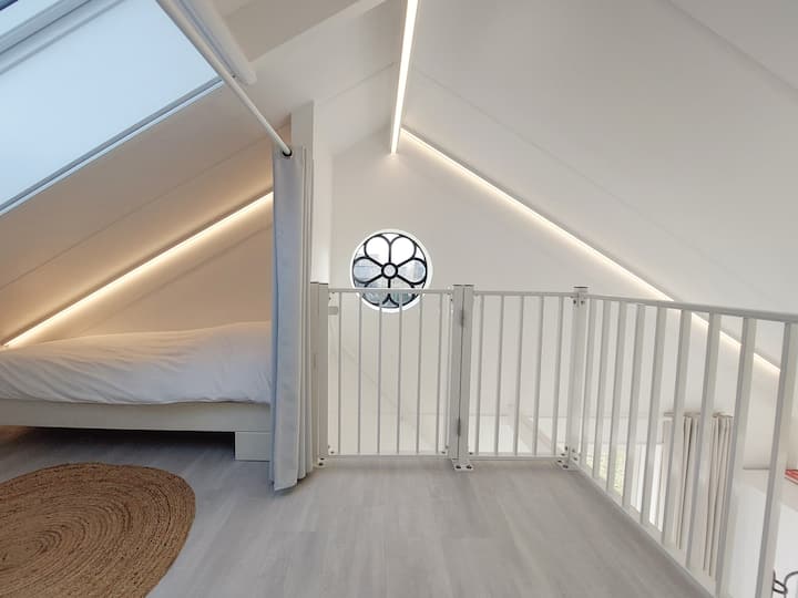The sleeping areas are separated by a curtain.
Please note that this offers less privacy than you might be used to. 

The beds have a size of 200x90 cm.
The cot is 120x60 cm. 

