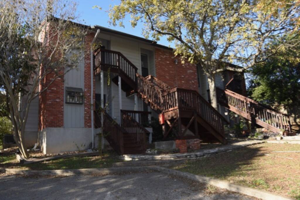 2nd story unit and adjacent to Texas State