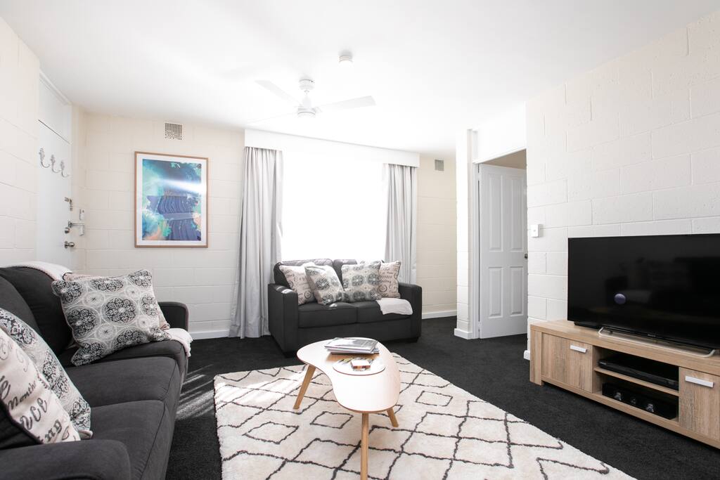 Comfy lounge suite with fold out couch