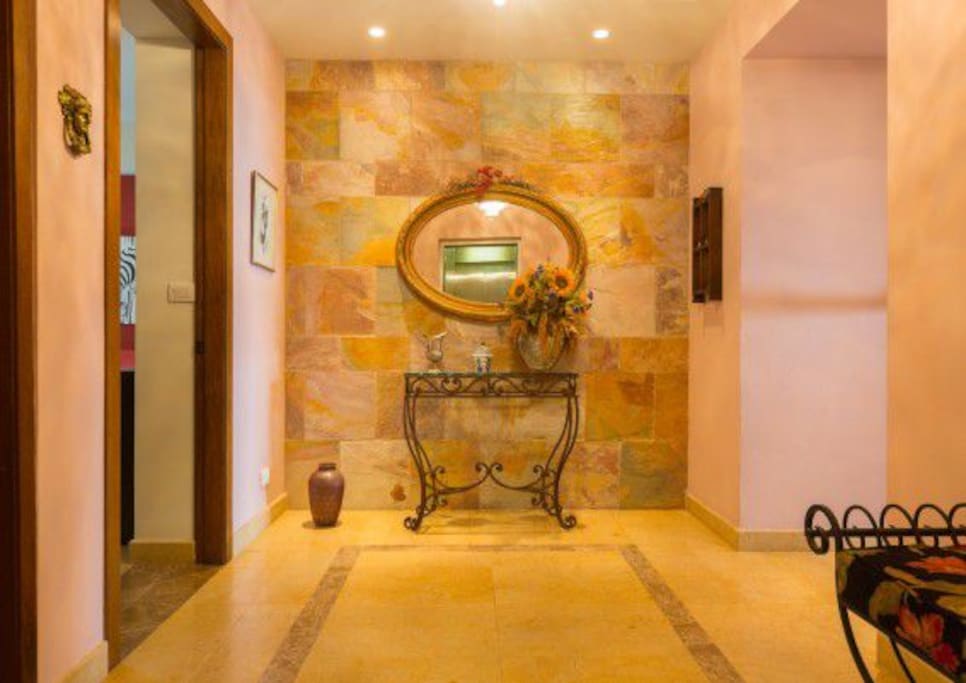 Private foyer which separates private upscale rooms from main condo area.