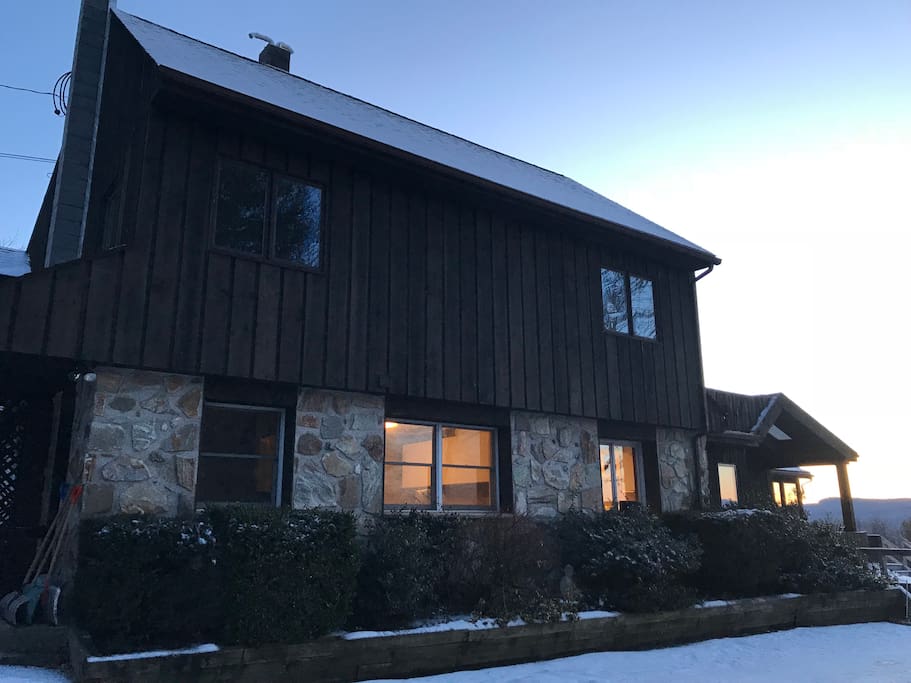 Apartment is located on upper level of house.