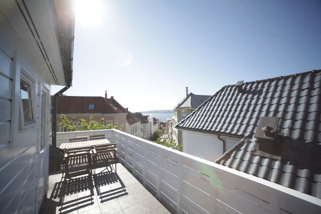 The balcony that you share with other guests is wonderful. Imagine sitting here enjoying the view of the Bergen rooftops, the ocean and beautiful sunsets.