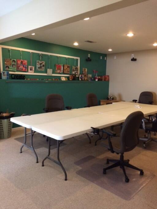 Table pod of 5 6-ft. tables next to kitchen.