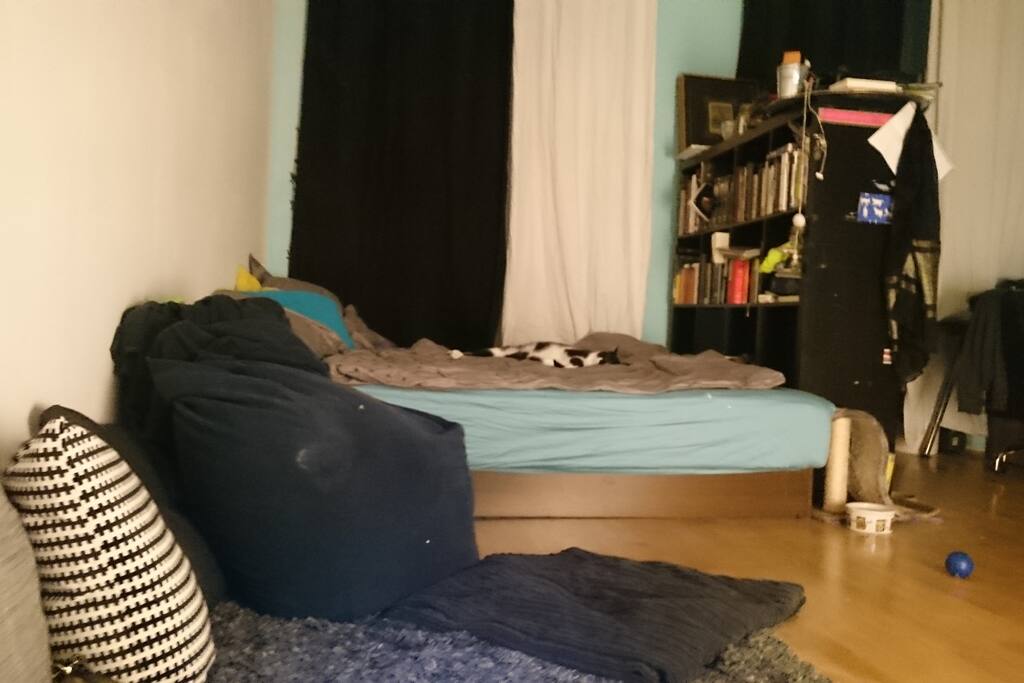 bed, books and cozy corner